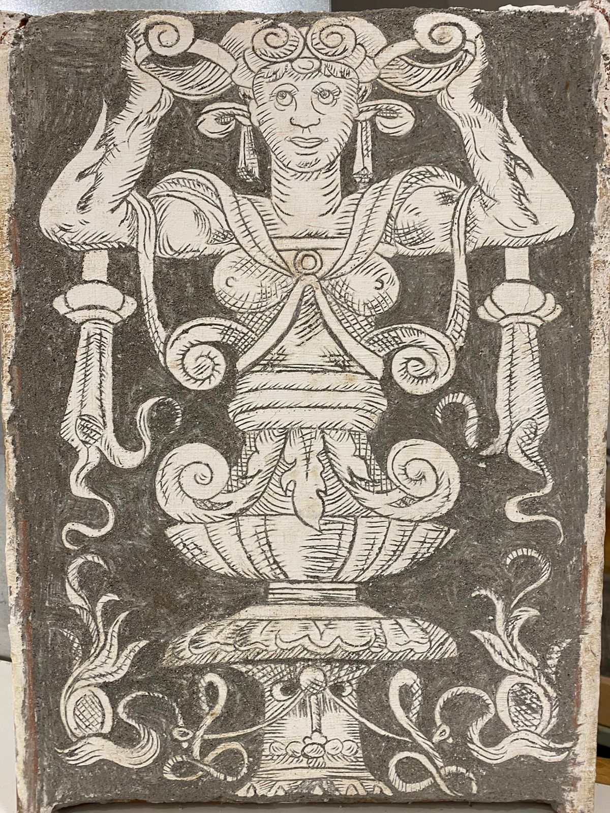 Incising the design